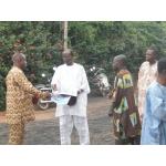 The former chairman of the Parish Council now the Patron greeting the other members of the Parish.jpg